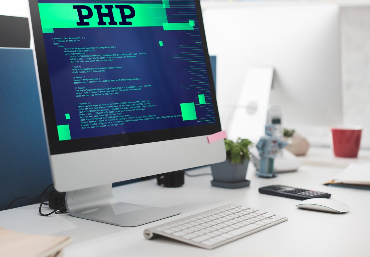 Desktop computer showing PHP code, the programming language WordPress runs on